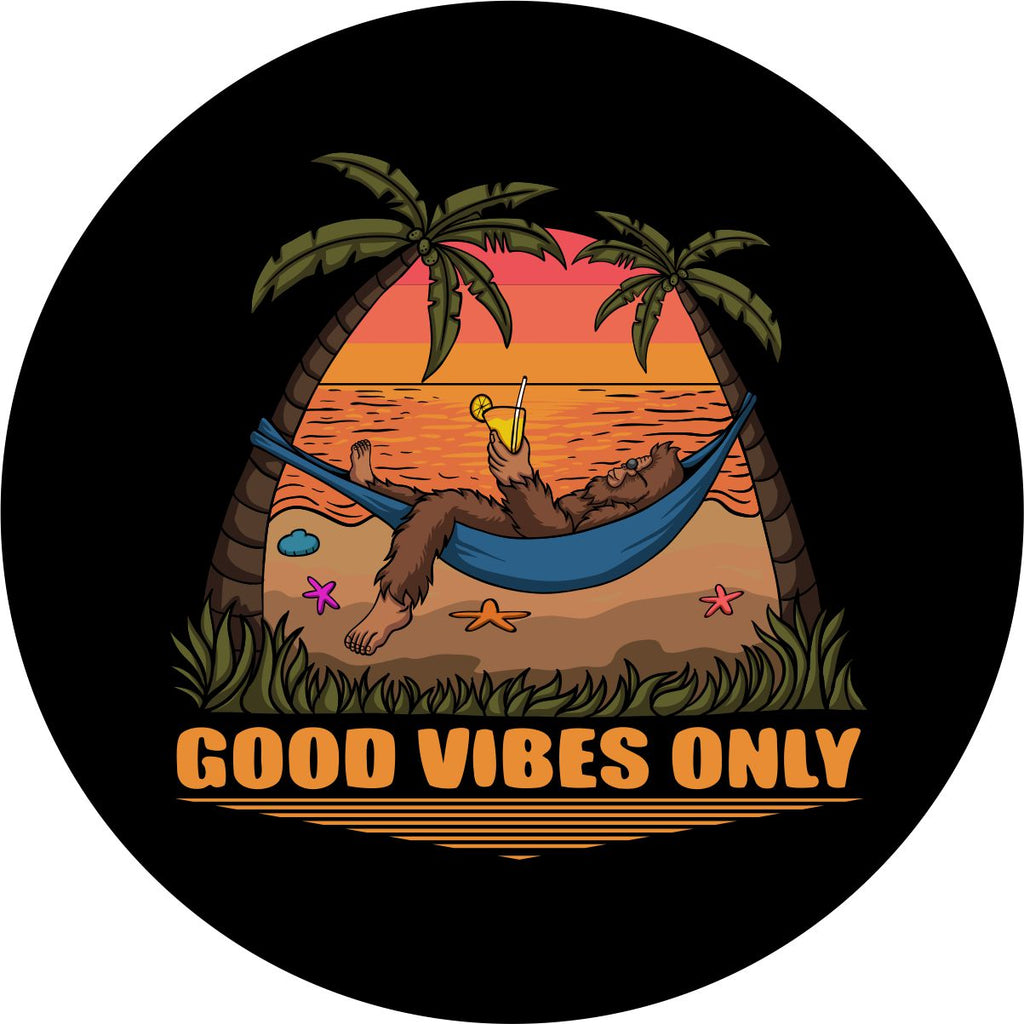 Custom spare tire cover, bigfoot tire cover design with sasquatch laying in a hammock sipping a drink at the beach. Good Vibes Only!