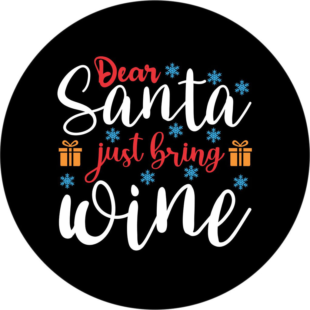 Funny Christmas spare tire cover with the saying, dear santa just bring wine.