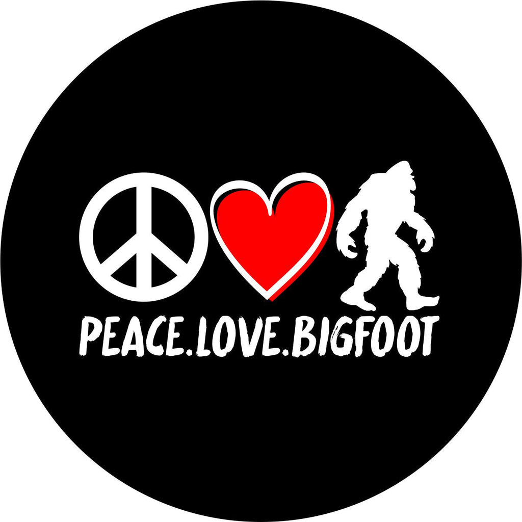 Black vinyl sasquatch spare tire cover. Peace icon, heart icon, bigfoot silhouette with the words peace, love, bigfoot underneath.