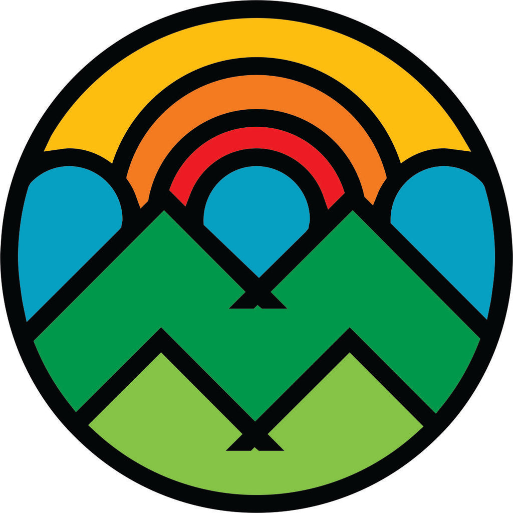 Big shapes and bright bold colors outlined in black make up the illusion of a mountain and sun scene spare tire cover design