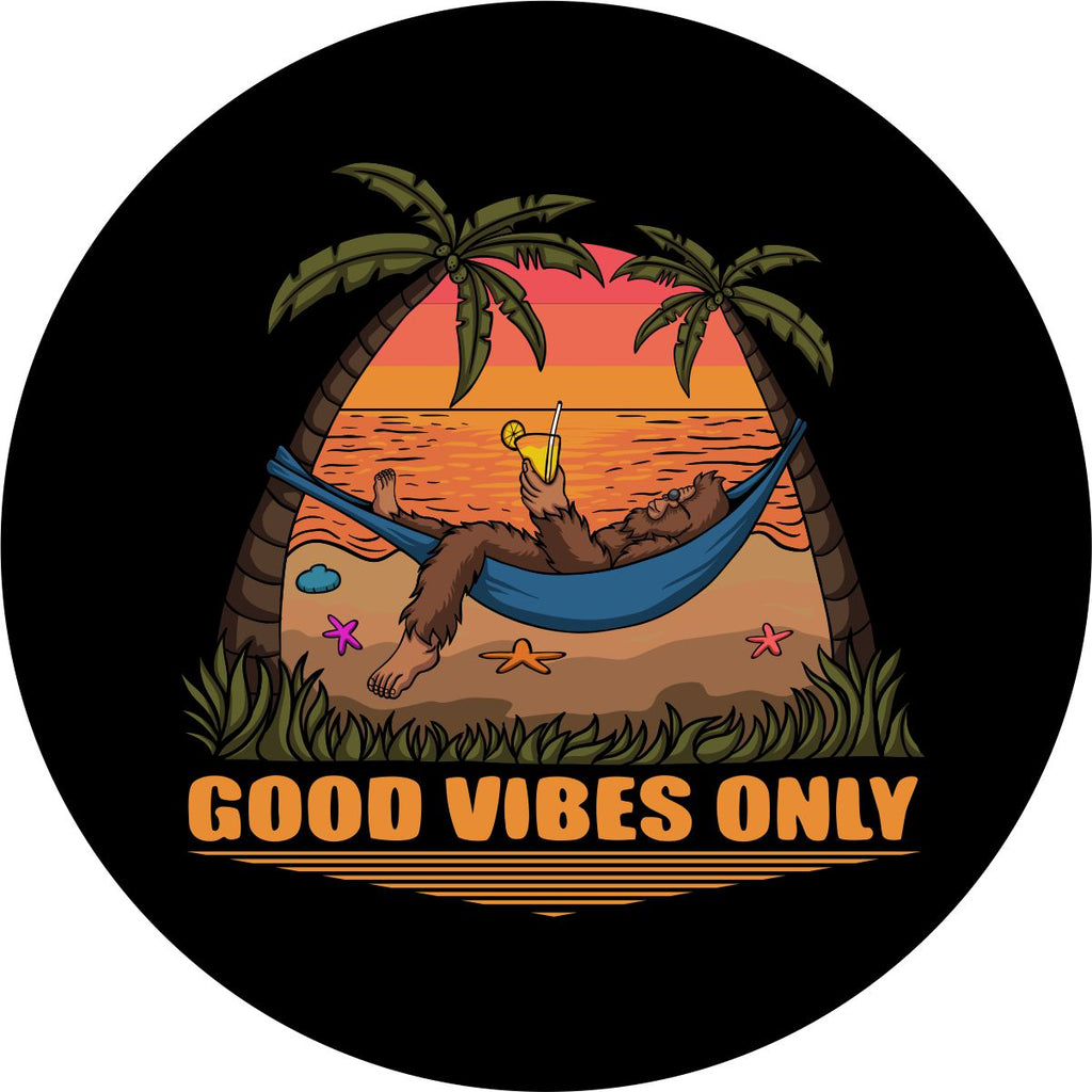 Custom spare tire cover, bigfoot tire cover design with sasquatch laying in a hammock sipping a drink at the beach. Good Vibes Only! 