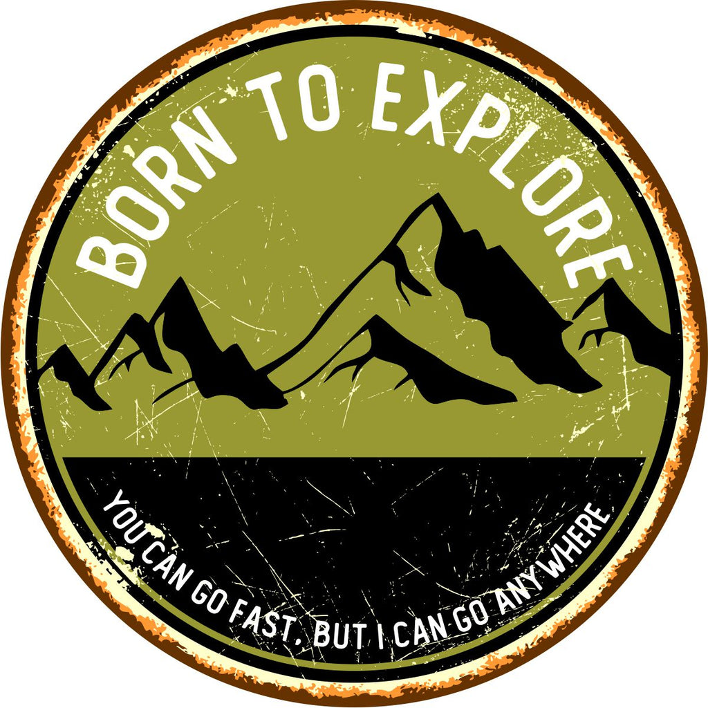 Rustic spare tire cover with mountain silhouette and the saying born to explore, you can go fast, but I can go anywhere