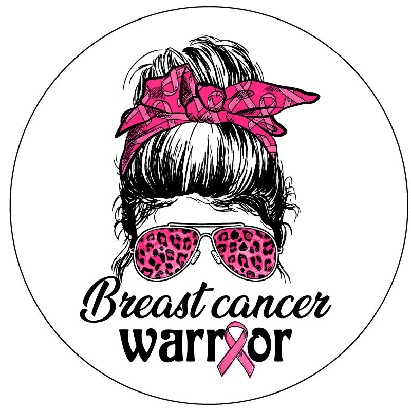Spare tire cover for campers, RV, Jeep, Broncos, trailers, and more. Design is a silhouette of a girl with a messy bun top knot and a breast cancer pink ribbon hair ribbon with pink leopard sunglasses plus the words breast cancer warrior for white vinyl spare tire cover.