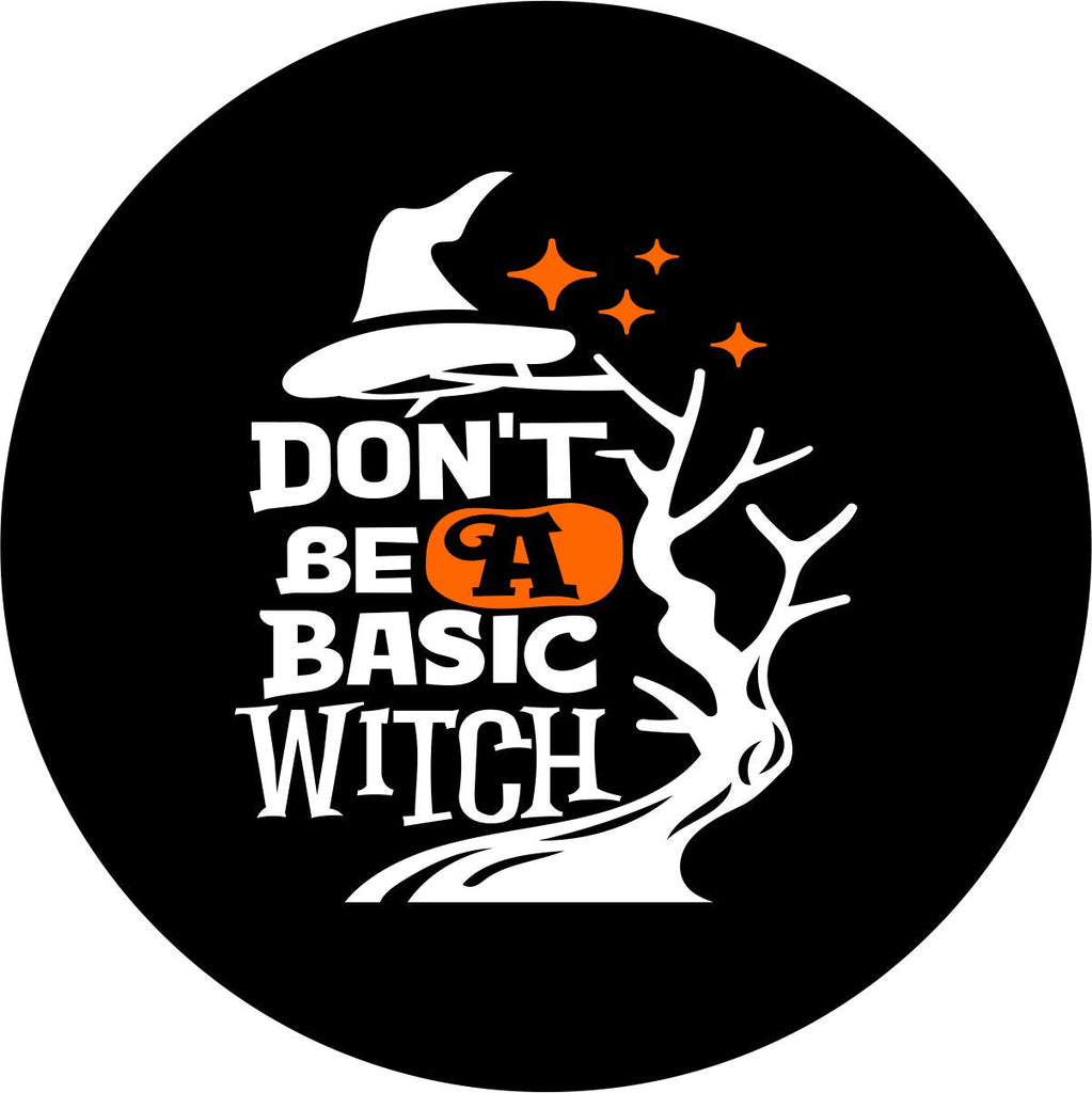 Jeep spare tire cover, RV spare tire cover, camper spare tire cover, bronco spare tire cover, and more. Design is on black vinyl with a cute font saying "Don't Be a Basic Witch" with a witch hat silhouette and a spooky tree. 