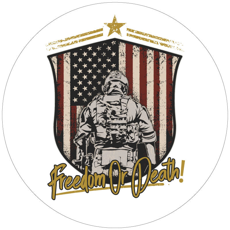 American flag insignia with a silhouette of the back of a soldier in front of the flag with the saying Freedom or Death in script on a white vinyl spare tire cover for Jeep, Bronco, RV, Camper, Van, and more