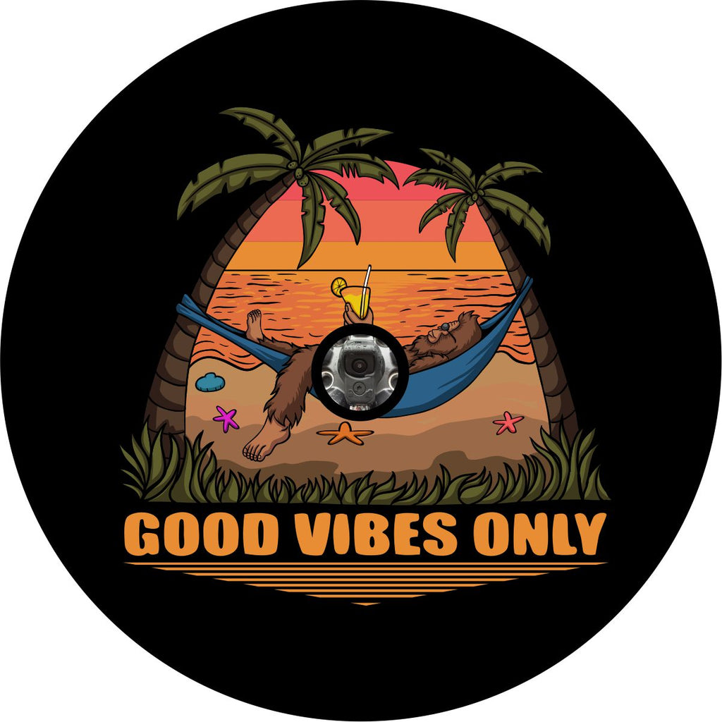 Custom spare tire cover, bigfoot tire cover design with sasquatch laying in a hammock sipping a drink at the beach. Good Vibes Only! Available for Jeep tire cover with camera hole