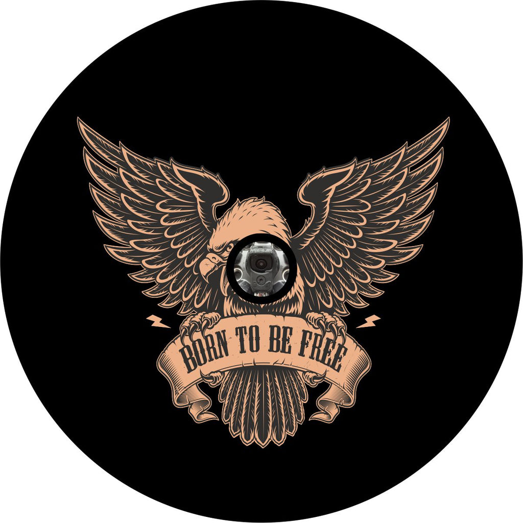 A vintage emblem of a fierce American bald eagle spare tire cover with a sign that says born to be free. Spare tire cover is designed with a camera hole to accommodate a back up camera.