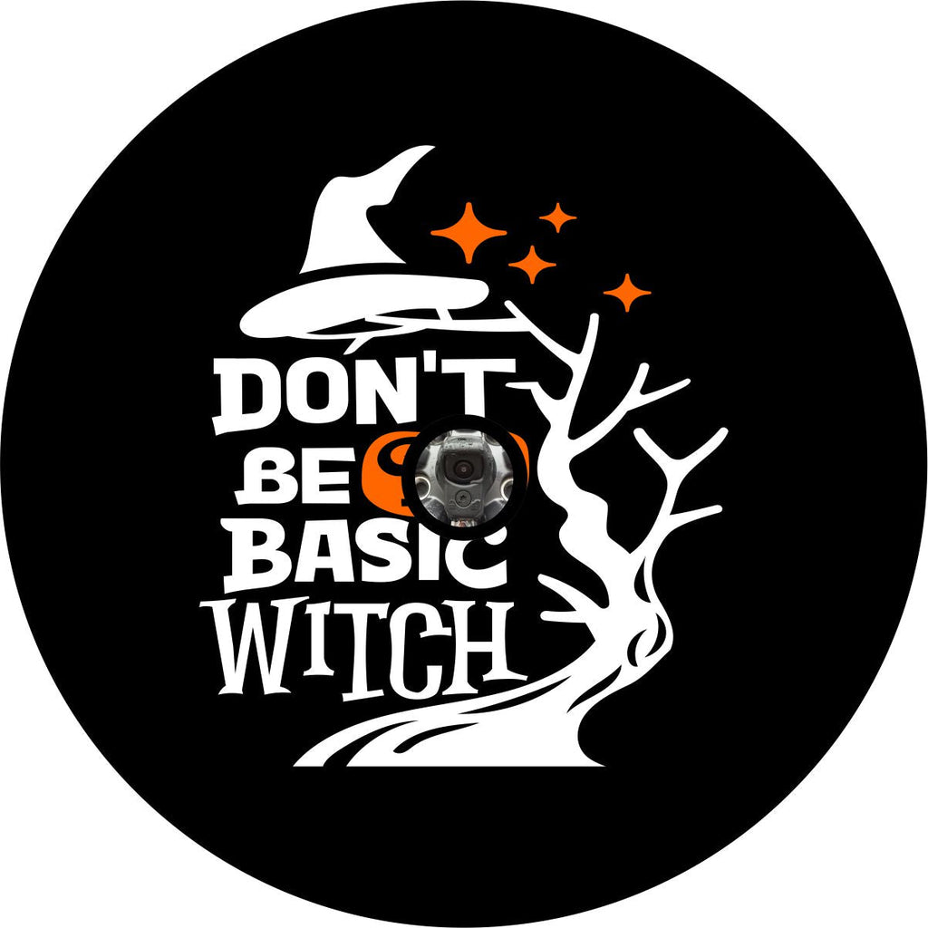 Jeep spare tire cover, RV spare tire cover, camper spare tire cover, bronco spare tire cover, and more. Design is on black vinyl with a cute font saying "Don't Be a Basic Witch" with a witch hat silhouette and a spooky tree with a back up camera design.