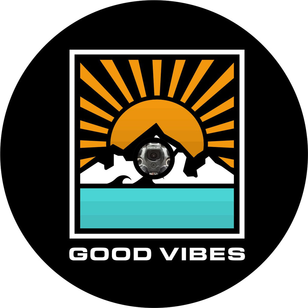 Geometric designed spare tire cover with a sun and sun rays, mountain, and water inside a rectangle with the words good vibes below for black vinyl tire cover. Spare tire cover for Bronco, Jeep, RV, Camper, trailer, and more. Design is crafted to fit spare tire covers with back up cameras.