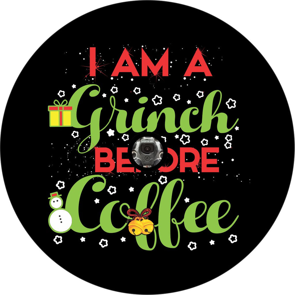 I am a grinch before coffee black vinyl spare tire cover design. Christmas themed spare tire cover design for Jeep, Bronco, RV, camper, and more with space for spare tires with back up camera holes. 