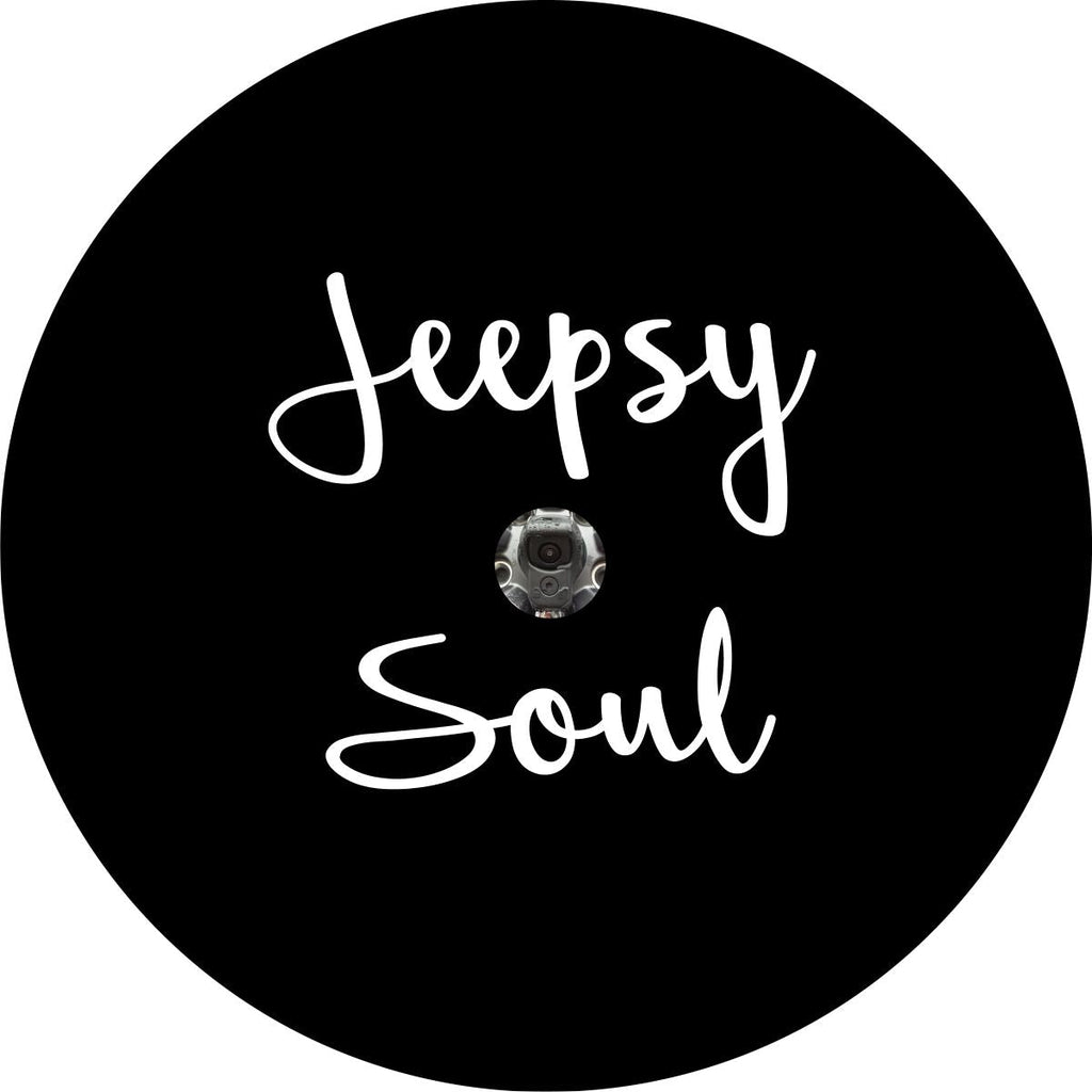 Jeepsy Soul script font written across a black spare tire cover for Jeep for a JL backup camera