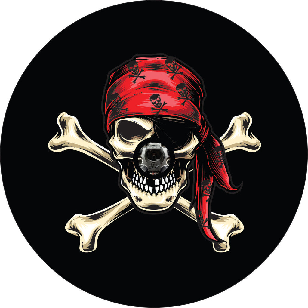 Graphic design skull and cross bones pirate spare tire cover with an eye patch and bandana over the skull. Spare tire cover design for any vehicle make and model such as a Jeep, RV, trailer, Bronco, camper, and more. Designed with a camera hole to accommodate a JL back up camera.