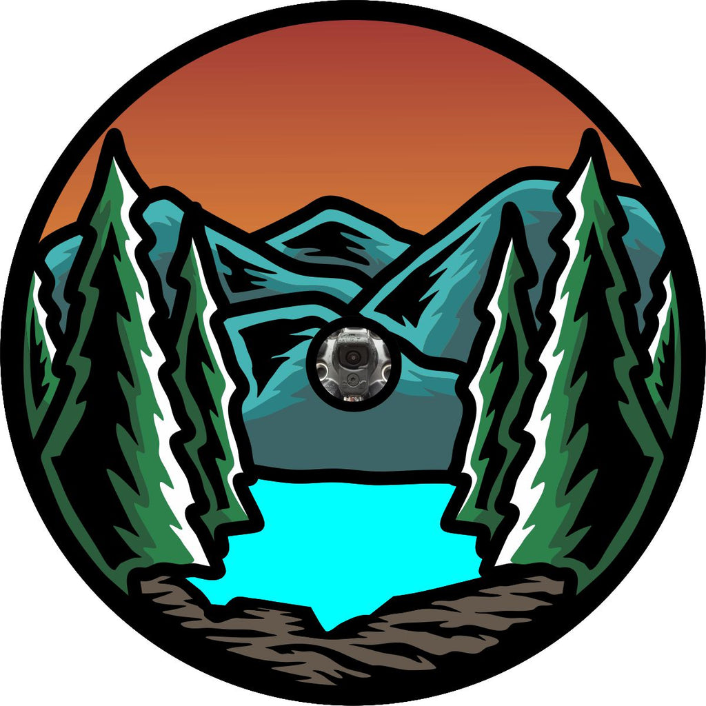 Edge to edge landscape graphic design of the mountains, lake, and trees spare tire cover design. Design for black vinyl spare tire cover with a back up camera.