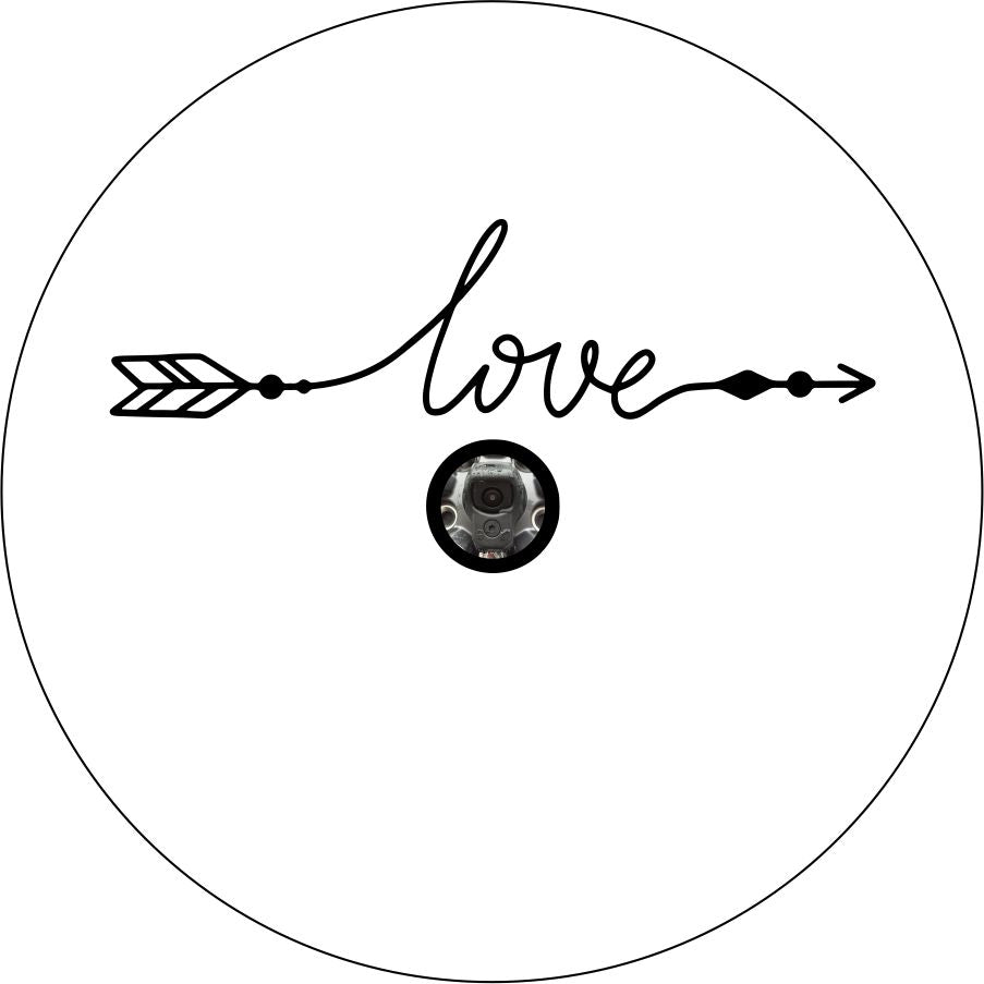 A simple spare tire cover design on white vinyl with a back up camera design of the word love in a cursive font that with the beginning and end intended to look like an arrow. 