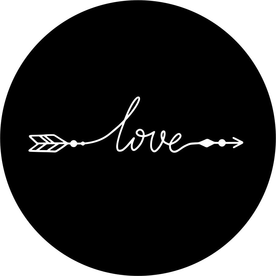 A simple spare tire cover design on black vinyl of the word love in a cursive font that with the beginning and end intended to look like an arrow. 