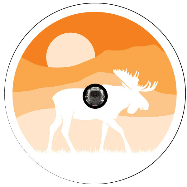 Spare tire cover design of a simple white silhouette of a moose walking with the background sunset in an orange Ombre design that can be custom made to fit the spare tire cover for a Jeep, Bronco, RV, travel trailer, camper, and more that has a back up camera