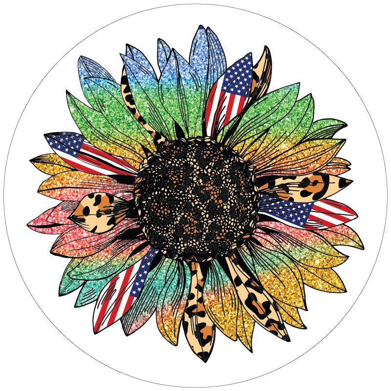A sunflower spare tire cover with rainbow sparkle petals, American flag petals, and cheetah print or leopard print animal print petals. This design is displayed to show the sunflower on a white vinyl spare tire cover 