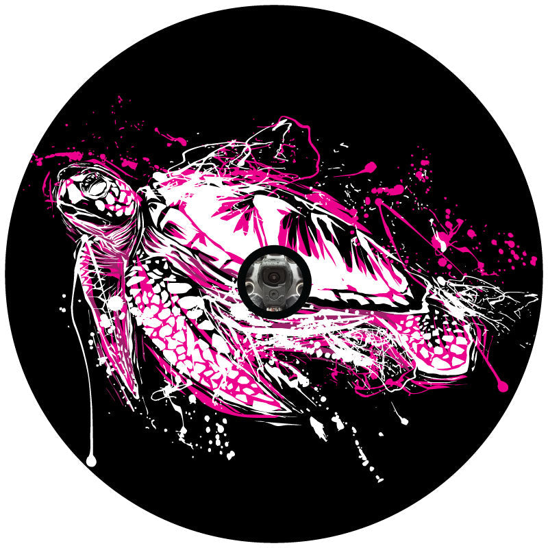 Tuscadero pink sea turtle paint splatter design spare tire cover for Jeep, Bronco, RV, camper, trailer, and more. Designed for black vinyl and a JL back up camera 