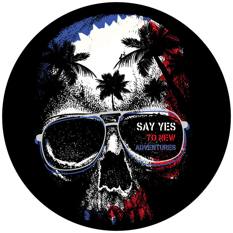 Patriotic colors red white and blue silhouette of a skull with palm trees in the head wearing sunglasses graphic design spare tire cover for black vinyl tire covers.