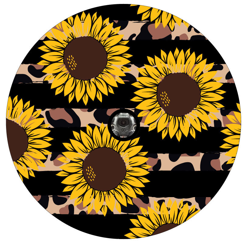 Black stripes with leopard or cheetah print stripes in the background and sunflowers in the foreground spare tire cover for Jeep, RV, Bronco, and more with JL back up camera accommodations