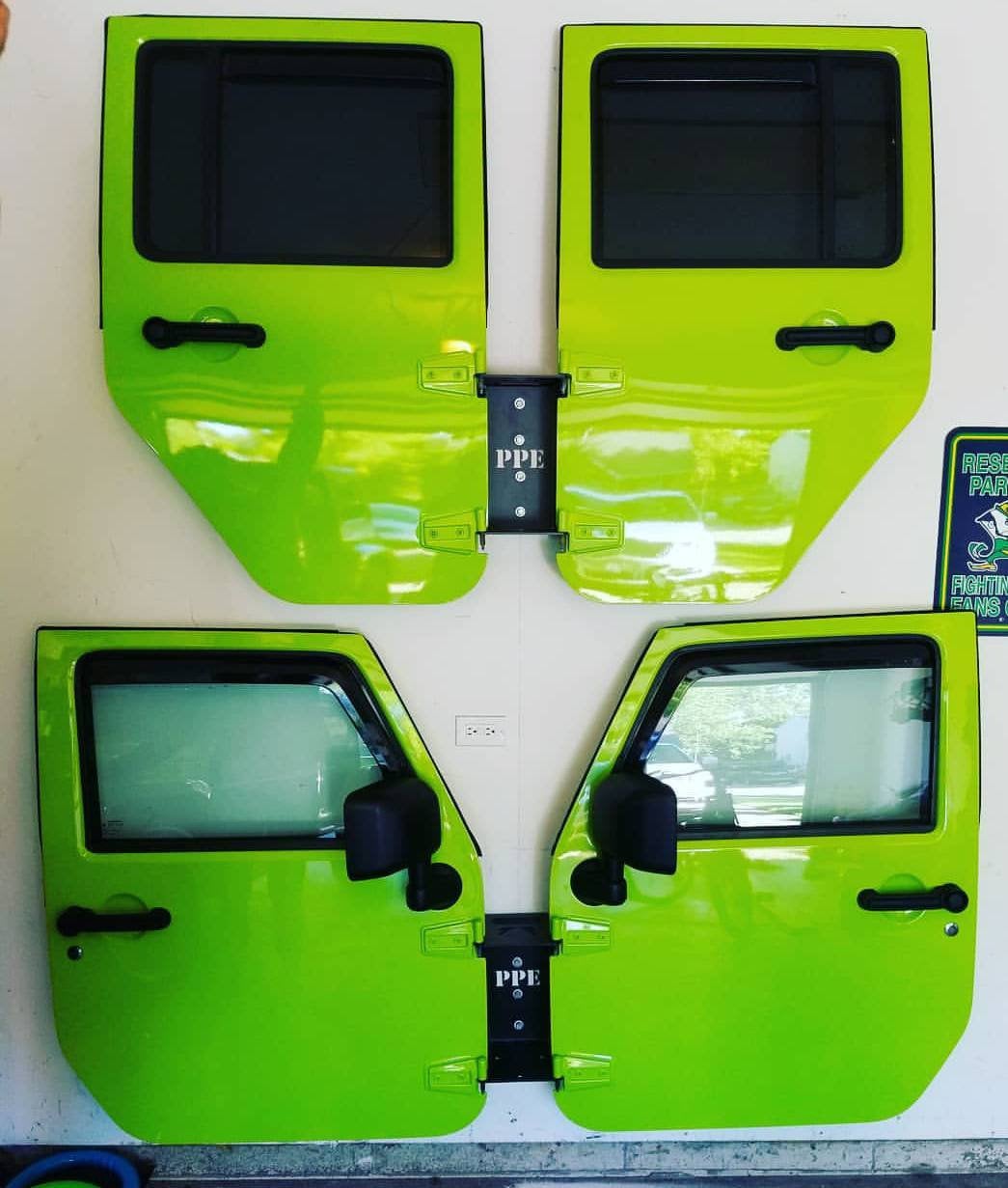Wall mounted Jeep door hanger. Single door holder holds 2 doors