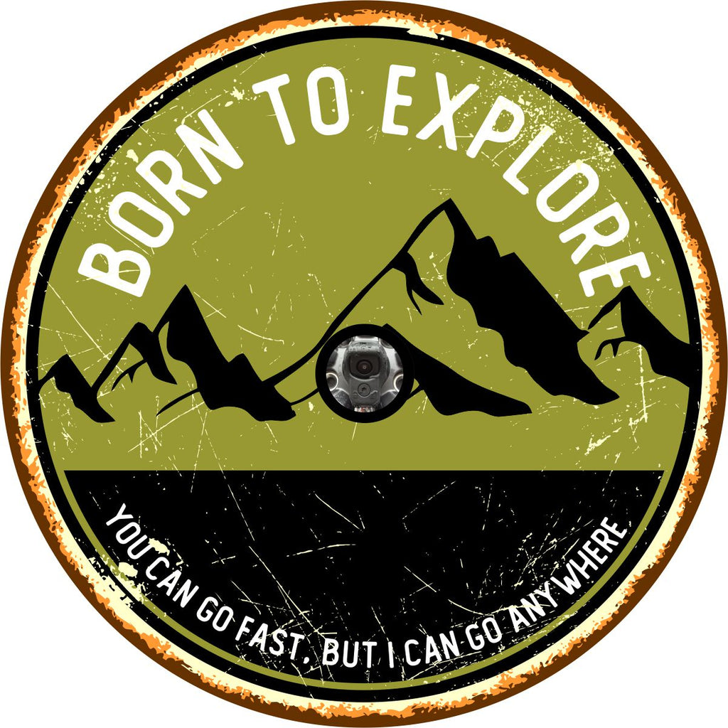 Rustic spare tire cover with mountain silhouette and the saying born to explore, you can go fast, but I can go anywhere with camera hole